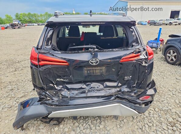 2T3RFREV6GW429700 2016 TOYOTA RAV4 Black Vista trasera