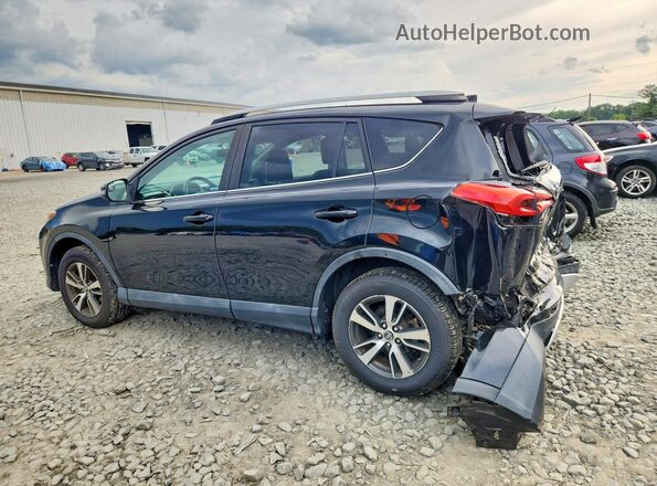 2T3RFREV6GW429700 2016 TOYOTA RAV4 Black Trasero izquierdo
