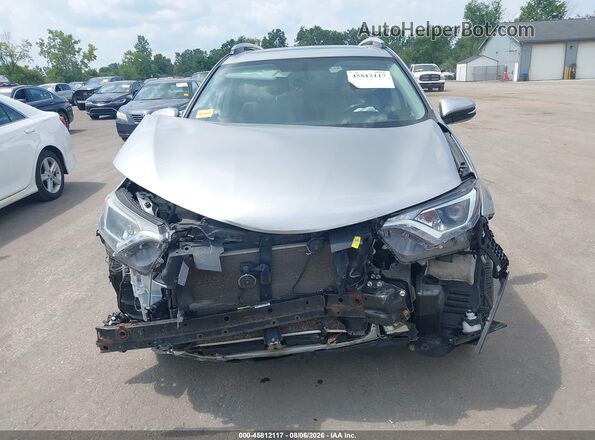 2T3RFREV6GW492361 2016 TOYOTA RAV4 Silver Vista interior trasera