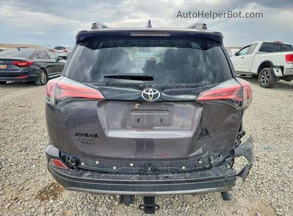 2T3RFREV6JW728059 2018 TOYOTA RAV4 Gray Вид ззаду