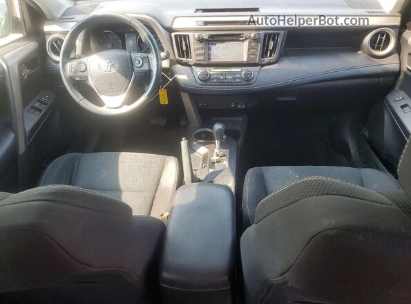 2T3RFREV6JW797219 2018 TOYOTA RAV4 Purple Vista del salpicadero