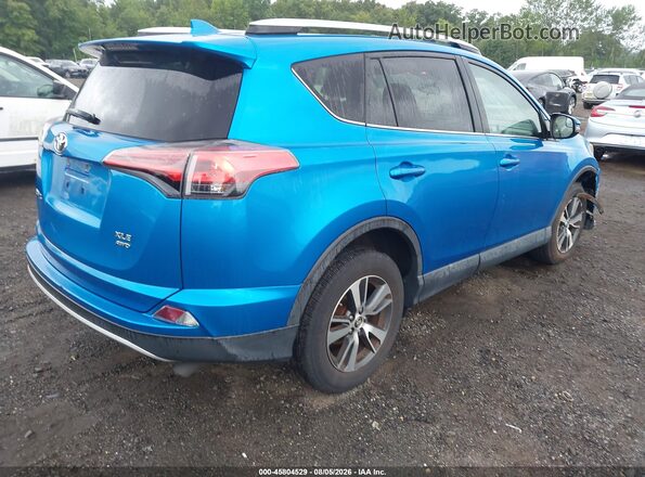 2T3RFREV7GW492627 2016 TOYOTA RAV4 Dark Blue Rear right