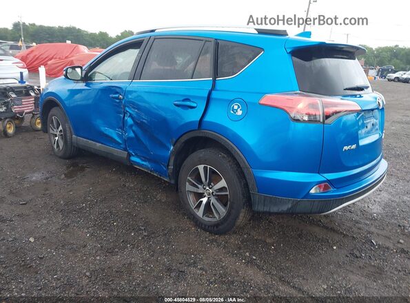 2T3RFREV7GW492627 2016 TOYOTA RAV4 Dark Blue Rear left