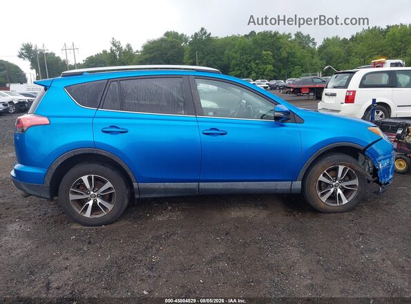 2T3RFREV7GW492627 2016 TOYOTA RAV4 Dark Blue Rear interior view