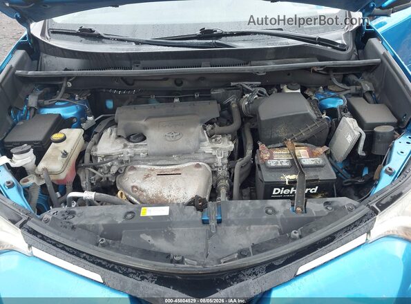 2T3RFREV7GW492627 2016 TOYOTA RAV4 Dark Blue Rear view