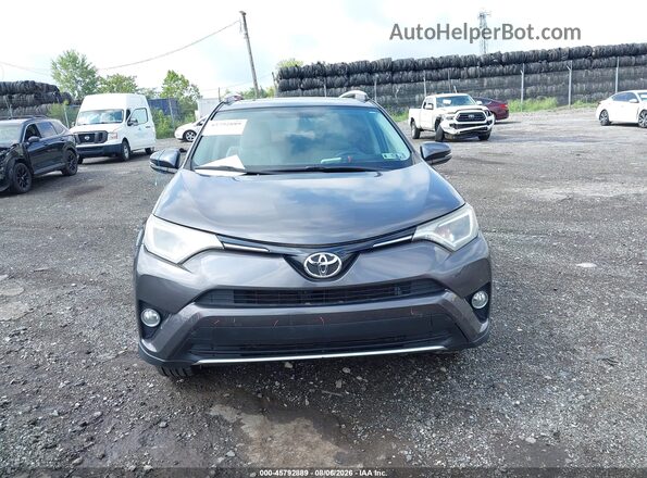 2T3RFREV7GW500290 2016 TOYOTA RAV4 Gray Widok z przodu