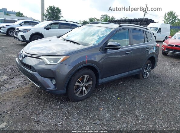 2T3RFREV7GW500290 2016 TOYOTA RAV4 Gray Przód lewy