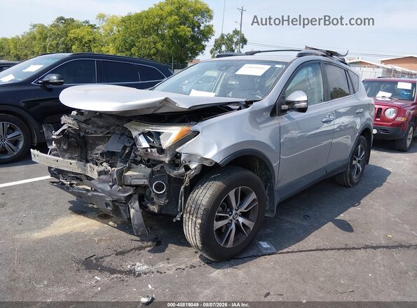 2T3RFREV7HW682459 2017 TOYOTA RAV4 Silver Vista tres cuartos delantera izquierda