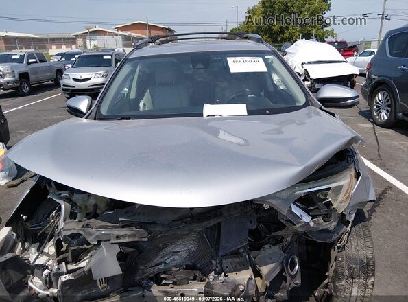 2T3RFREV7HW682459 2017 TOYOTA RAV4 Silver Vista trasera
