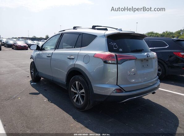 2T3RFREV7HW682459 2017 TOYOTA RAV4 Silver Trasero izquierdo