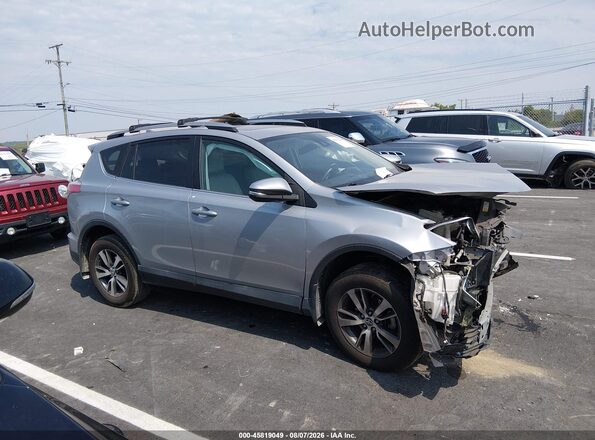 2T3RFREV7HW682459 2017 TOYOTA RAV4 Silver Vista interior trasera