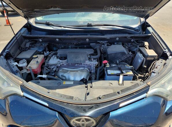 2T3RFREV7JW743623 2018 TOYOTA RAV4 Blue Widok komory silnika