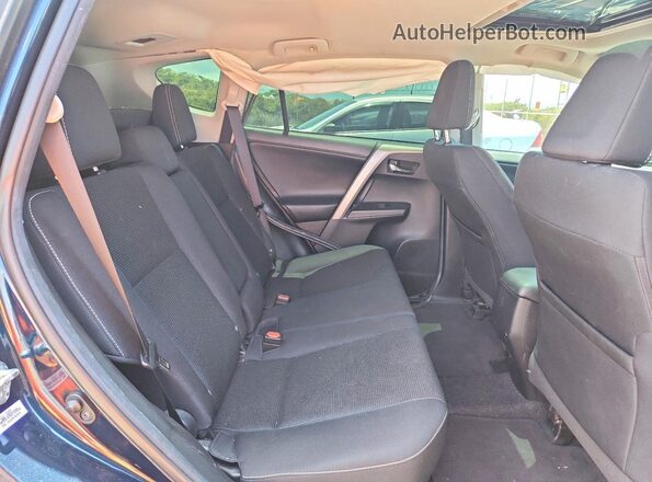 2T3RFREV7JW743623 2018 TOYOTA RAV4 Blue Widok wnętrza z tyłu
