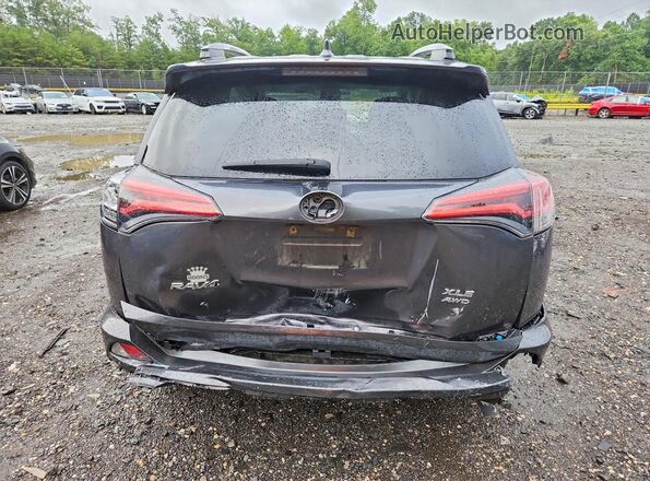 2T3RFREV7JW775438 2018 TOYOTA RAV4 Gray უკანა ხედი