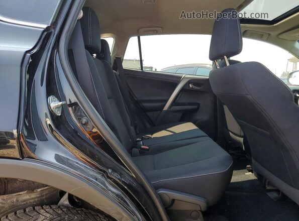2T3RFREV7JW799416 2018 TOYOTA RAV4 Black უკანა სალონის ხედი