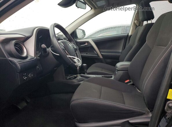 2T3RFREV7JW799416 2018 TOYOTA RAV4 Black წინა სალონის ხედი