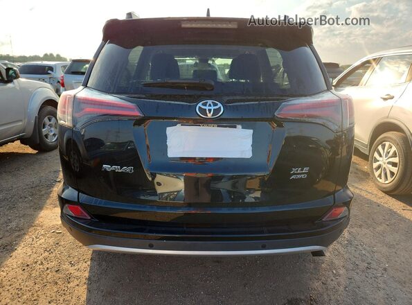 2T3RFREV8GW474198 2016 TOYOTA RAV4 Black Вид ззаду