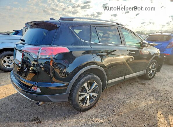 2T3RFREV8GW474198 2016 TOYOTA RAV4 Black Задня права чверть