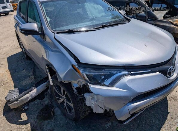 2T3RFREV8GW513694 2016 TOYOTA RAV4 Серый Передняя правая четверть