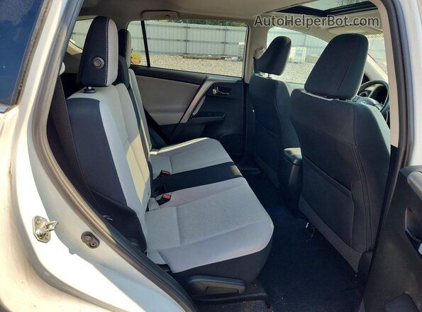 2T3RFREV8JW847246 2018 TOYOTA RAV4 White უკანა სალონის ხედი
