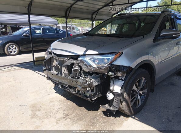 2T3RFREV9GW526003 2016 TOYOTA RAV4 Silver Вид спереду