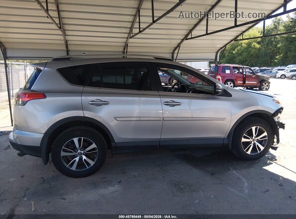 2T3RFREV9GW526003 2016 TOYOTA RAV4 Silver Вид задньої частини салону
