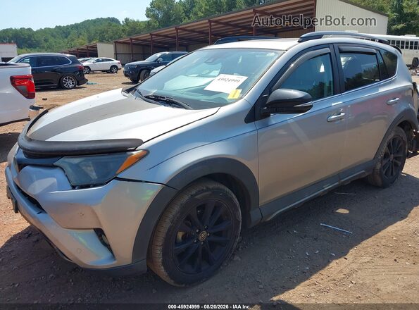 2T3RFREV9JW715239 2018 TOYOTA RAV4 Silver Передня ліва чверть