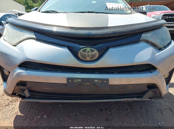 2T3RFREV9JW715239 2018 TOYOTA RAV4 Silver 