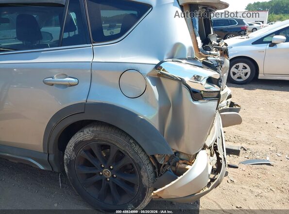2T3RFREV9JW715239 2018 TOYOTA RAV4 Silver 