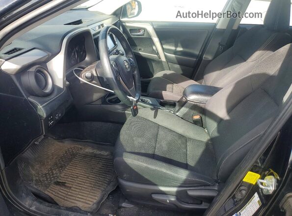 2T3RFREV9JW716570 2018 TOYOTA RAV4 Black Front interior view