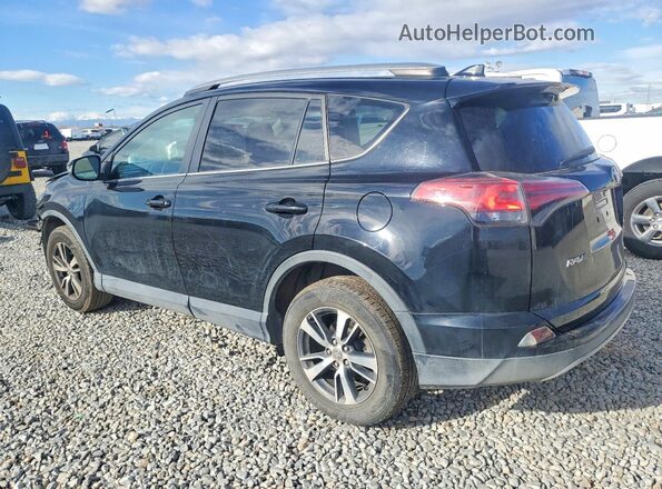 2T3RFREV9JW716570 2018 TOYOTA RAV4 Black Rear left