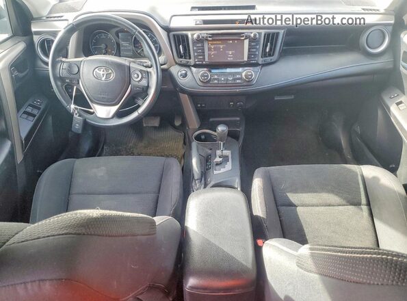 2T3RFREV9JW716570 2018 TOYOTA RAV4 Black Dashboard view