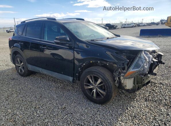 2T3RFREV9JW716570 2018 TOYOTA RAV4 Black Front right