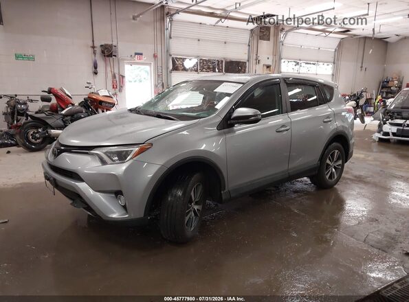2T3RFREV9JW789566 2018 TOYOTA RAV4 Silver წინა მარცხენა ხედი სამი მეოთხედიდან