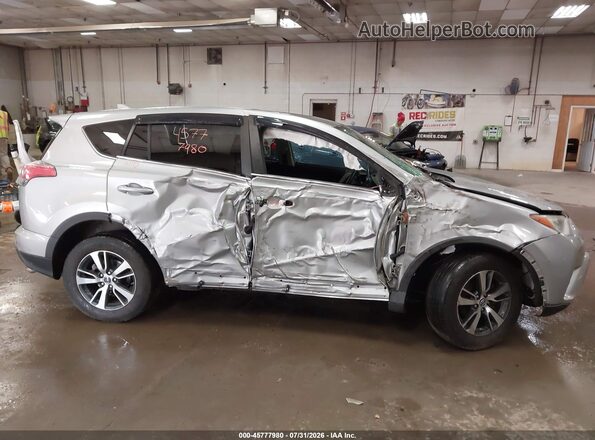 2T3RFREV9JW789566 2018 TOYOTA RAV4 Silver წინა ხედი