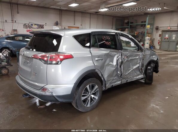2T3RFREV9JW789566 2018 TOYOTA RAV4 Silver უკანა მარჯვენა