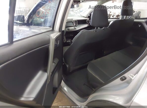 2T3RFREV9JW789566 2018 TOYOTA RAV4 Silver VIN კოდის სტიკერის ხედი