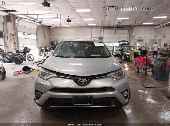 2T3RFREV9JW789566 2018 TOYOTA RAV4 Silver ხელსაწყოთა პანელის ხედი