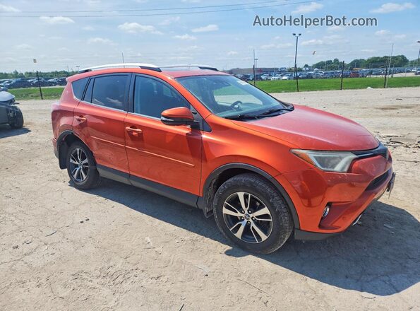 2T3RFREVXGW534238 2016 TOYOTA RAV4 Orange Вид салону спереду