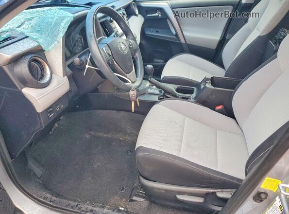 2T3RFREVXHW645227 2017 TOYOTA RAV4 Silver Front interior view