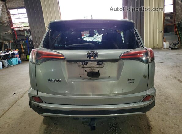 2T3RFREVXJW803524 2018 TOYOTA RAV4 Silver Vista trasera