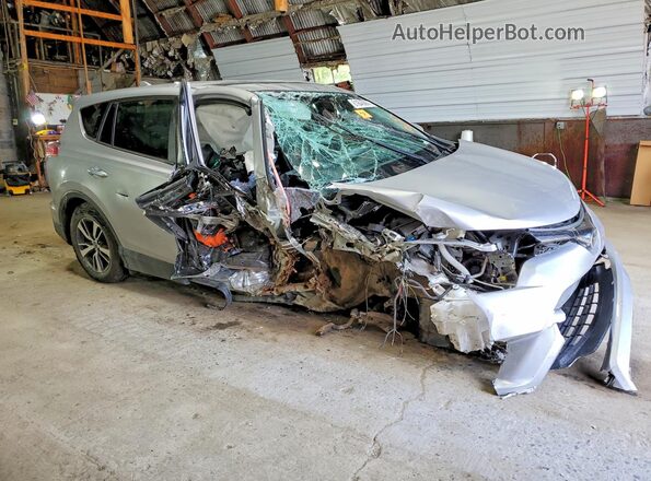 2T3RFREVXJW803524 2018 TOYOTA RAV4 Silver Delantero derecho