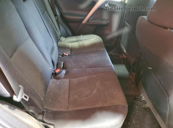 2T3RFREVXJW803524 2018 TOYOTA RAV4 Silver Vista de los asientos traseros