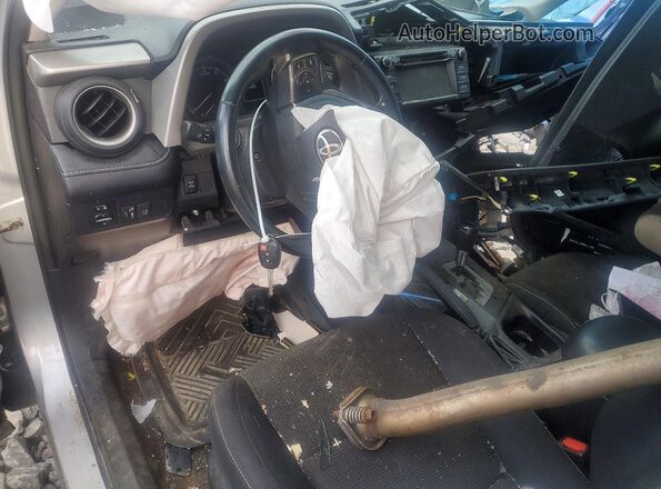 2T3RFREVXJW803524 2018 TOYOTA RAV4 Silver Vista del salpicadero