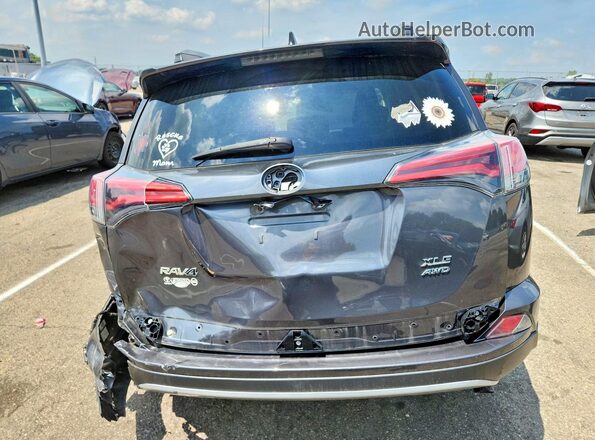 2T3RFREVXJW851623 2018 TOYOTA RAV4 Gray უკანა ხედი