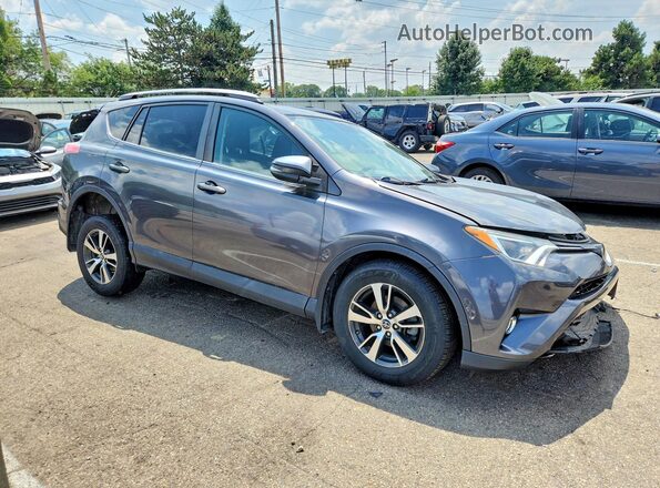 2T3RFREVXJW851623 2018 TOYOTA RAV4 Gray წინა მარჯვენა