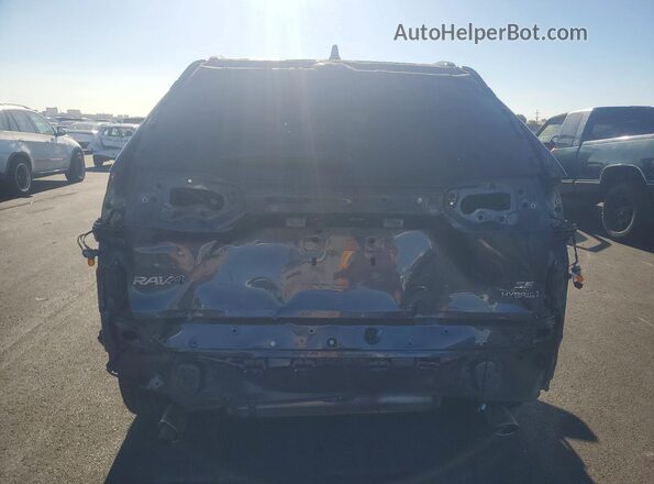 2T3T6RFV2NW030607 2022 TOYOTA RAV4 Gray Rear view