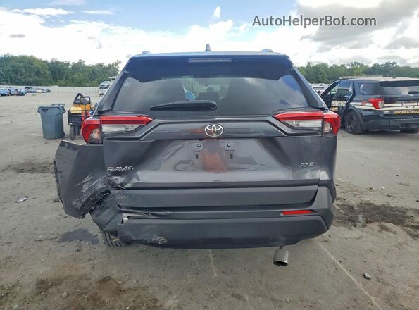 2T3W1RFV2PC230595 2023 TOYOTA RAV4 Gray Rear view
