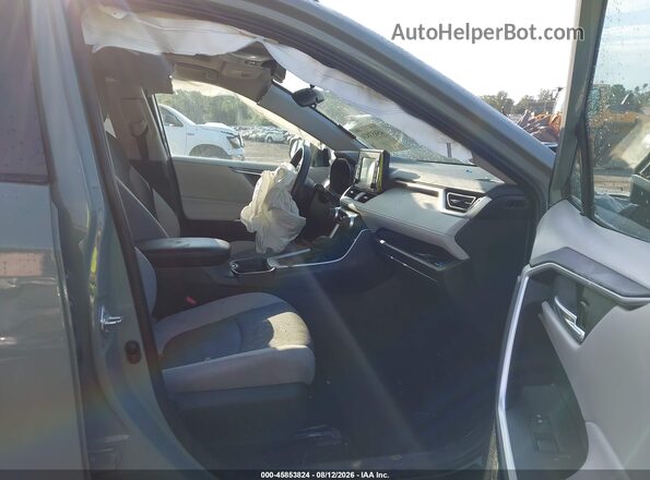 2T3W1RFV7MW175572 2021 TOYOTA RAV4 Зеленый Вид салона спереди