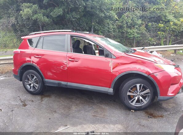 2T3WFREV0GW237191 2016 TOYOTA RAV4 Red უკანა სალონის ხედი